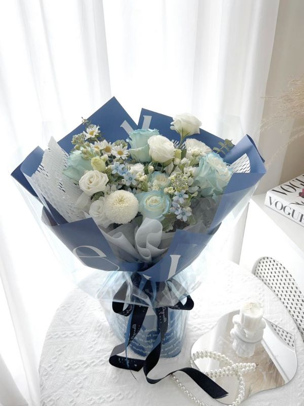 Morning Dew Wrapped Bouquet – White and Blue Roses, Daisies, and Chrysanthemums - NYC Bouquet Delivery